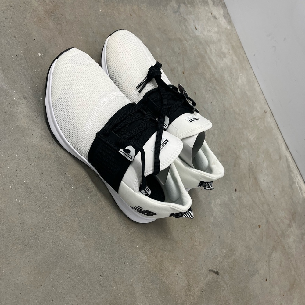 New Balance Women's Black and White Sneakers